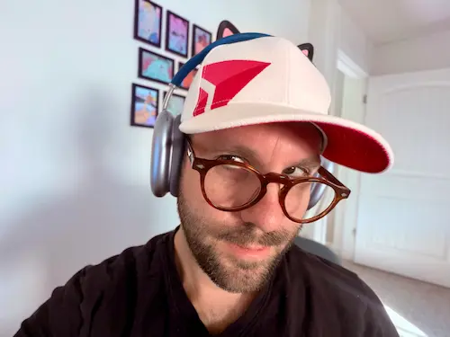Selfie of Matt wearing a Delta Air Lines hat in support of the Breast Cancer Research Foundation
