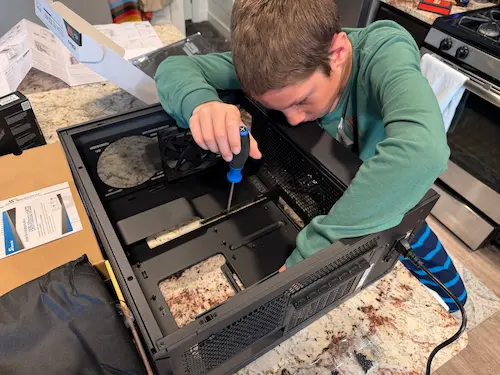 My son screws in motherboard offset mounts